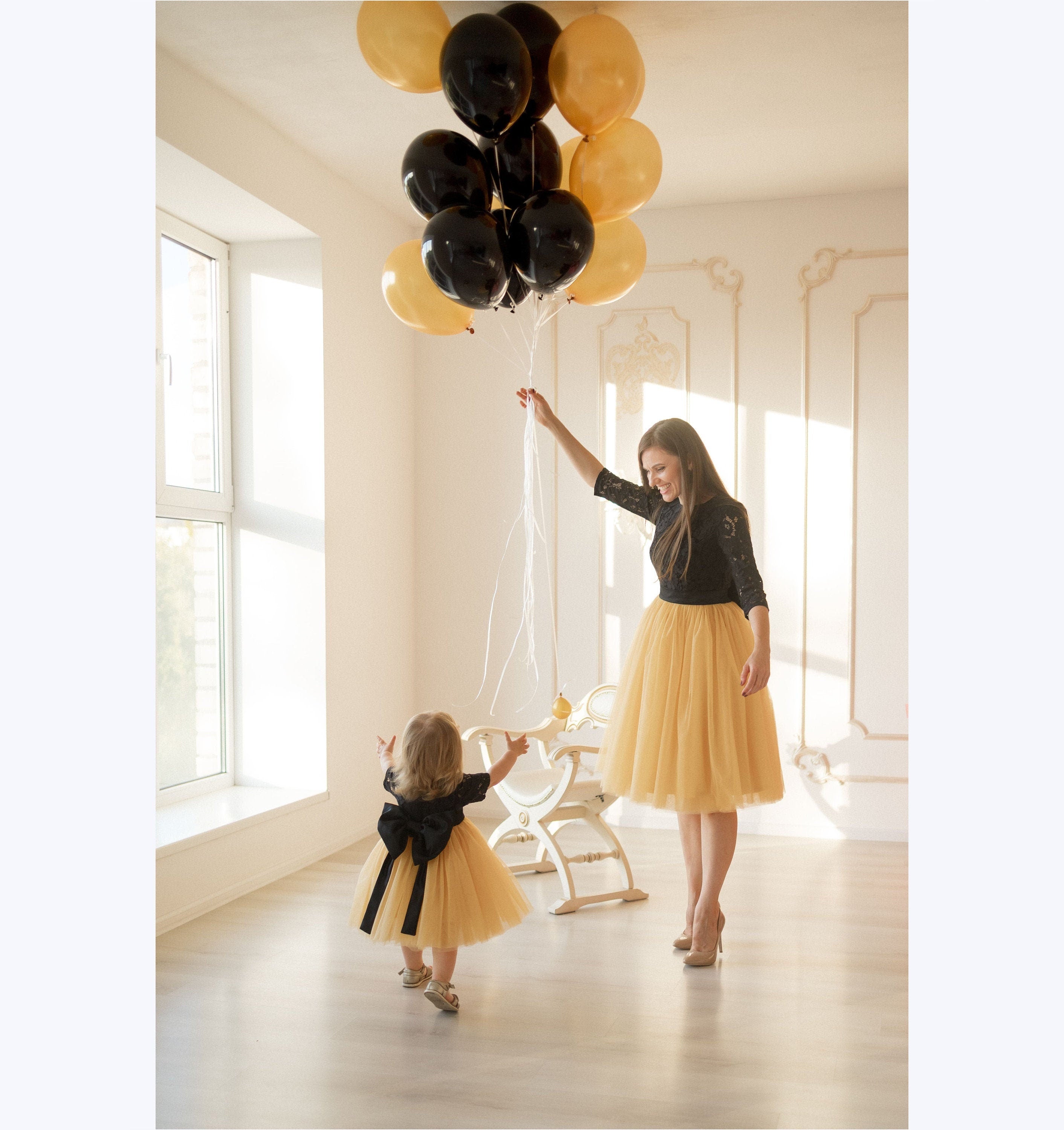 black and gold tutu dress Black Ruffled Tulle Dress With Gold Accents
