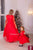 Matching party red dresses with pearls and feathers for mother and daughter