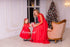 Matching party red dresses with pearls and feathers for mother and daughter