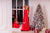 Matching party red dresses with pearls and feathers for mother and daughter