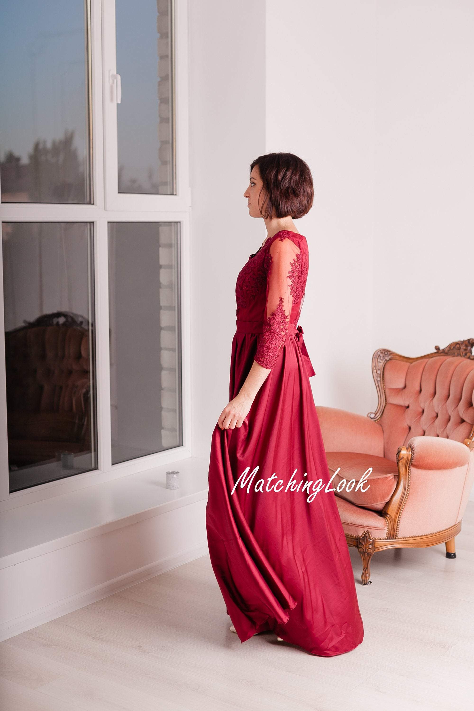 Photo of Wine Colour Gown with Sheer Neck and Full Sleeves